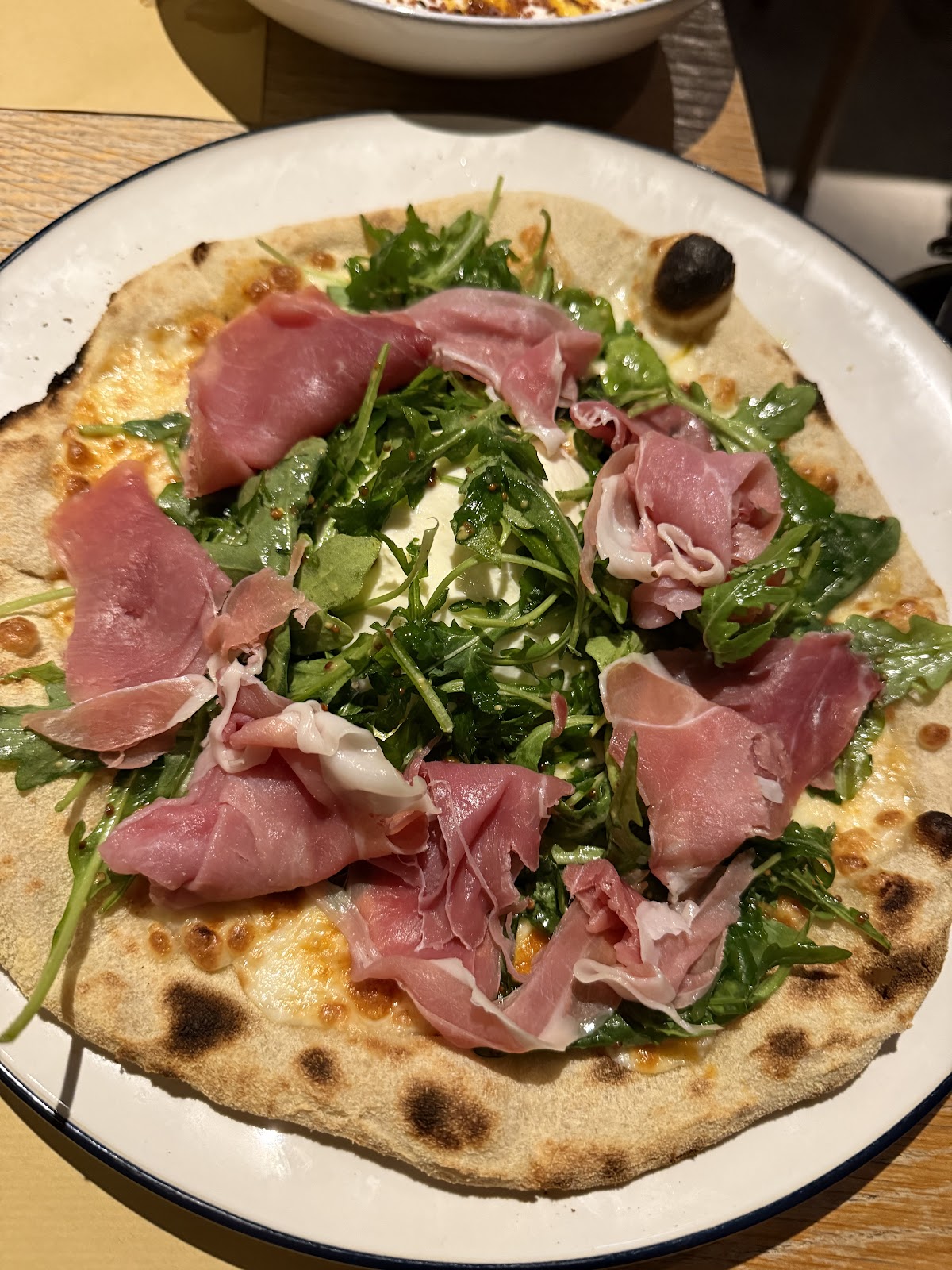 Rocket and ham pizza